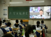 记者手记：心有坚守 逐梦太空