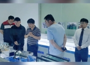 西北工业集团董事长张百锋一行到光电股份交流工作